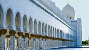 a large white building with a domed roof