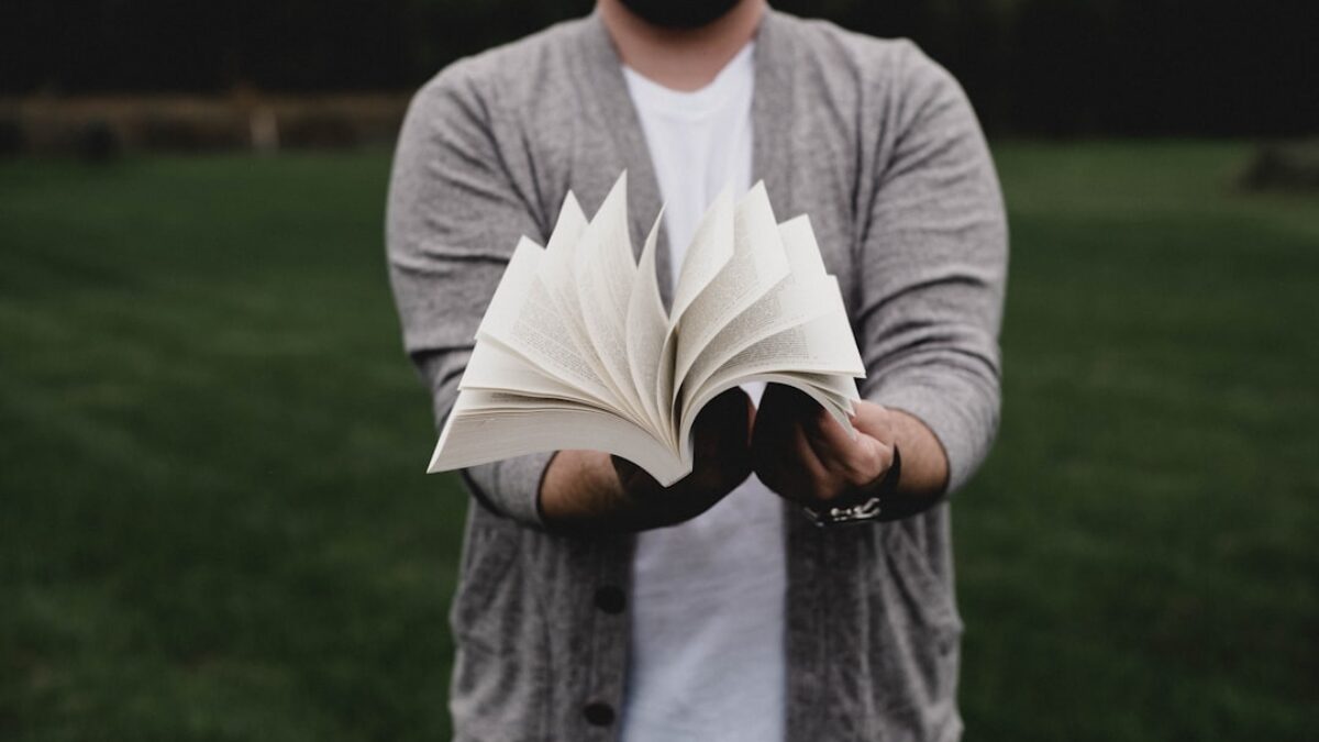 person opening book